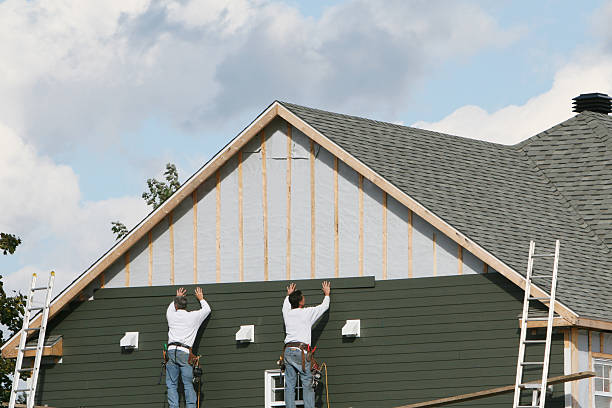 Professional Siding Installation technician working in Perryopolis, PA